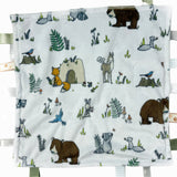 Baby blanket with forest animal illustrations on a white background