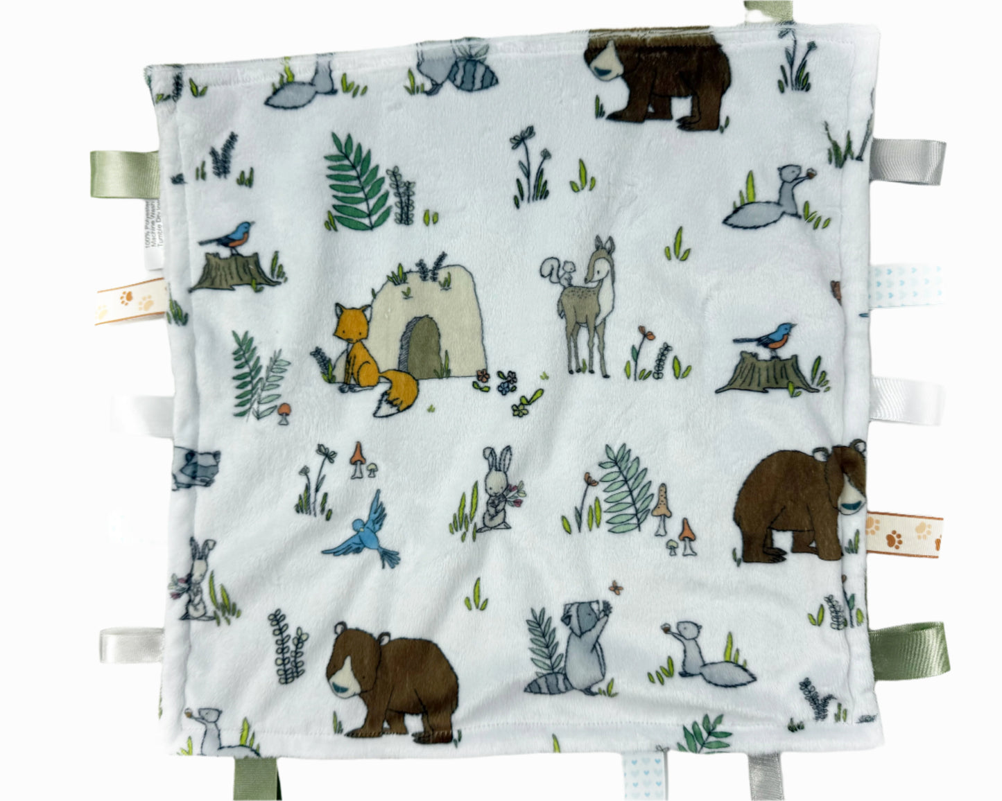 Baby blanket with forest animal illustrations on a white background