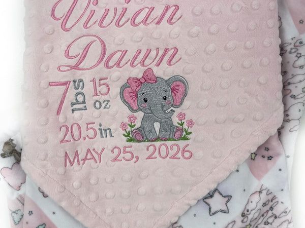 Baby blanket with personalized text and elephant design on a pink background