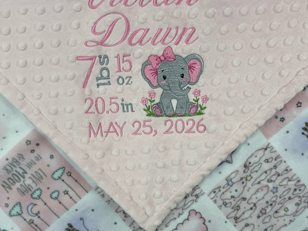 Baby blanket with elephant design and personalized text on a pink background