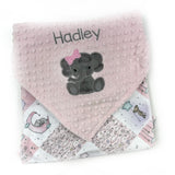 Pink baby blanket with gray elephant design and 'Hadley' text on a white background