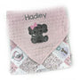 Pink baby blanket with gray elephant design and 'Hadley' text on a white background