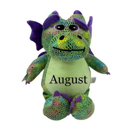 Personalized green stuffed dragon with name August, perfect keepsake baby gift and photo prop.
